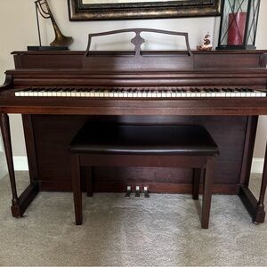 Elegant Brown Upright Piano with Bench
